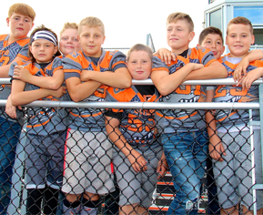 group of boys wearing football jerseys